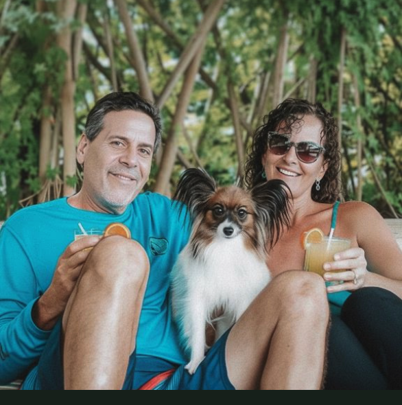 Jesse and Karen, VIVARA's founders, with their dog at the estate